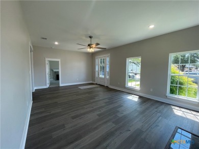 This exceptional property, situated on a high-exposure corner