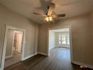 This exceptional property, situated on a high-exposure corner