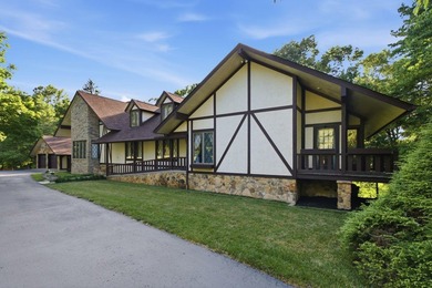 Welcome to 305 Beech Street, a truly special Tudor-inspired home - photo 2