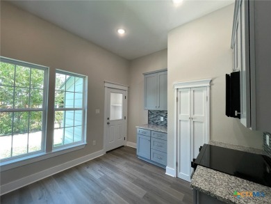 This exceptional property, situated on a high-exposure corner