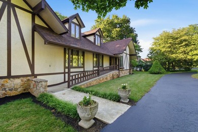 Welcome to 305 Beech Street, a truly special Tudor-inspired home - photo 6