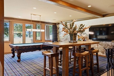 Perched behind a grand gated entrance and winding tree-lined - photo 27