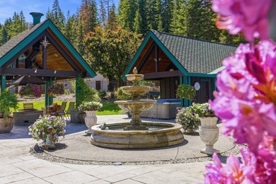Perched behind a grand gated entrance and winding tree-lined - photo 33