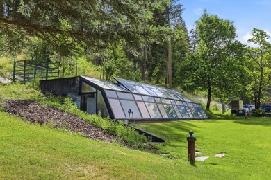 Perched behind a grand gated entrance and winding tree-lined - photo 39