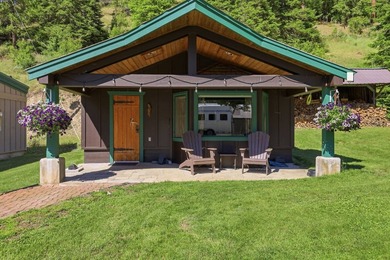 Perched behind a grand gated entrance and winding tree-lined - photo 42