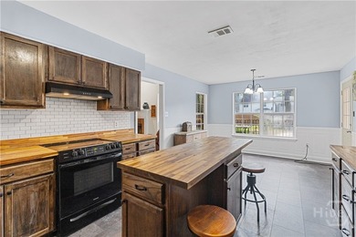 PRICE ADJUSTMENT! Welcome to your dream home nestled in a mature - photo 12