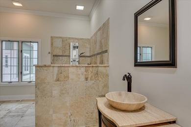 This exceptional three-bedroom, three-bathroom residence - photo 35