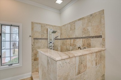 This exceptional three-bedroom, three-bathroom residence - photo 37