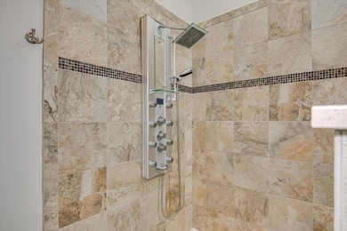 This exceptional three-bedroom, three-bathroom residence - photo 38