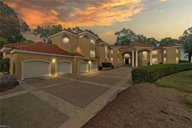 Welcome to this exquisite Spanish-style waterfront estate which