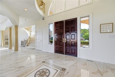 Welcome to this exquisite Spanish-style waterfront estate which