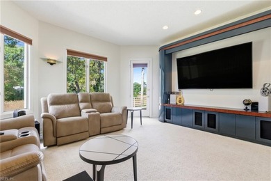 Welcome to this exquisite Spanish-style waterfront estate which