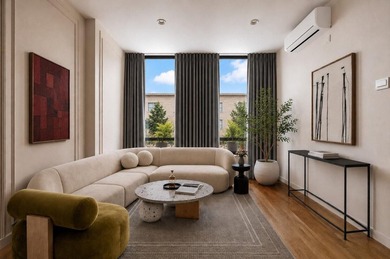 Welcome to 12 Lawton Street, a seven-unit condominium in the - photo 1