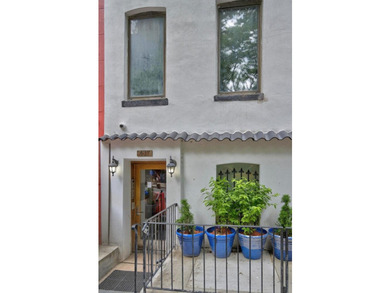 Set on a charming tree-lined townhouse block in the heart of - photo 5