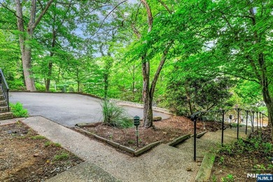 Perched in the highly desirable Pines Lake community, this - photo 2