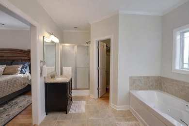 Fully furnished golf course home in gated Shiloh Falls! This