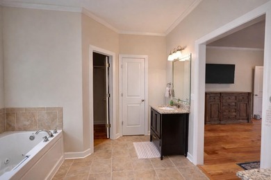 Fully furnished golf course home in gated Shiloh Falls! This