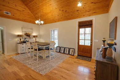 Fully furnished golf course home in gated Shiloh Falls! This