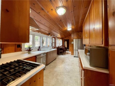 Secluded cabin overlooking Bass Lake on a half-acre lot. - photo 8