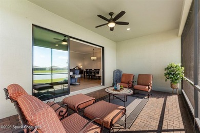 Enjoy waterfront living from this airy 3-bedroom, 4-bath home in - photo 11