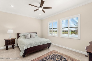 Enjoy waterfront living from this airy 3-bedroom, 4-bath home in - photo 12