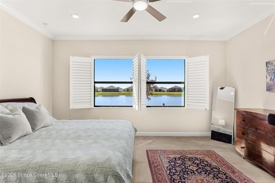 Enjoy waterfront living from this airy 3-bedroom, 4-bath home in - photo 13