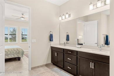 Enjoy waterfront living from this airy 3-bedroom, 4-bath home in - photo 17