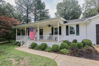 Discover peaceful lake area living at this home in Gilbertsville - photo 8