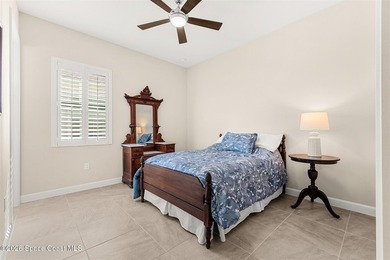 Enjoy waterfront living from this airy 3-bedroom, 4-bath home in - photo 18