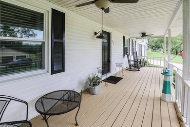 Discover peaceful lake area living at this home in Gilbertsville - photo 9