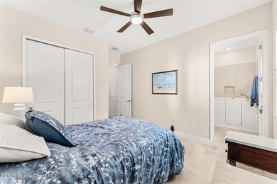 Enjoy waterfront living from this airy 3-bedroom, 4-bath home in - photo 19