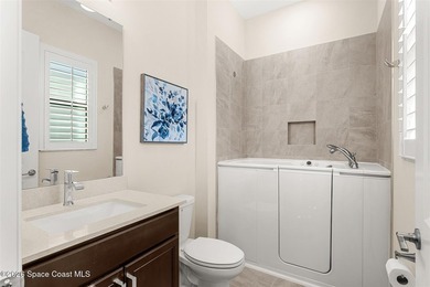 Enjoy waterfront living from this airy 3-bedroom, 4-bath home in - photo 20