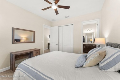Enjoy waterfront living from this airy 3-bedroom, 4-bath home in - photo 24