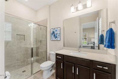 Enjoy waterfront living from this airy 3-bedroom, 4-bath home in - photo 25