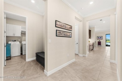 Enjoy waterfront living from this airy 3-bedroom, 4-bath home in - photo 26