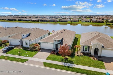 Enjoy waterfront living from this airy 3-bedroom, 4-bath home in - photo 30