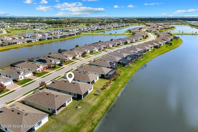 Enjoy waterfront living from this airy 3-bedroom, 4-bath home in - photo 31