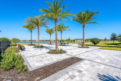 Enjoy waterfront living from this airy 3-bedroom, 4-bath home in - photo 35