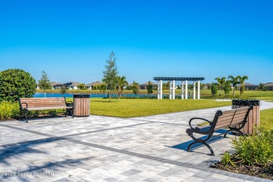 Enjoy waterfront living from this airy 3-bedroom, 4-bath home in - photo 37