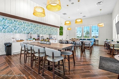 Enjoy waterfront living from this airy 3-bedroom, 4-bath home in - photo 40