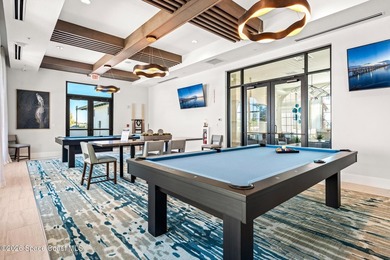 Enjoy waterfront living from this airy 3-bedroom, 4-bath home in - photo 42