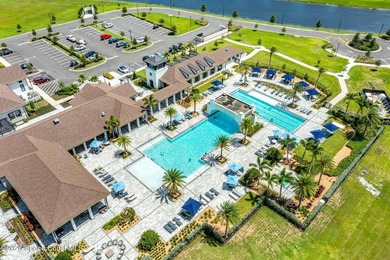 Enjoy waterfront living from this airy 3-bedroom, 4-bath home in - photo 45