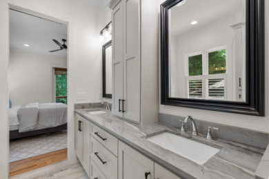 A waterfront masterpiece boasting custom curated features - photo 11