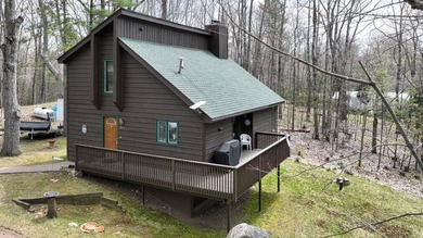Upper Kaubashine Lake Home Active Under Contract in Hazelhurst Wisconsin