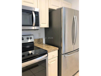 Nice condo with 2 beds/2 baths located in the gated community of - photo 3