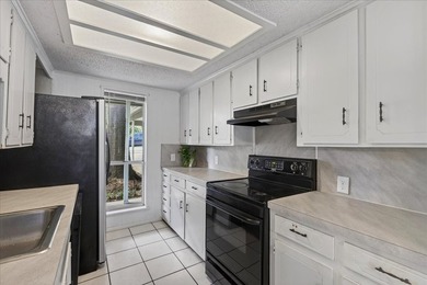 Enjoy lakefront living in this 3-bedroom, 2-bath home located in - photo 10