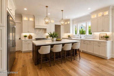 Experience exceptional luxury in this custom-built luxury - photo 5