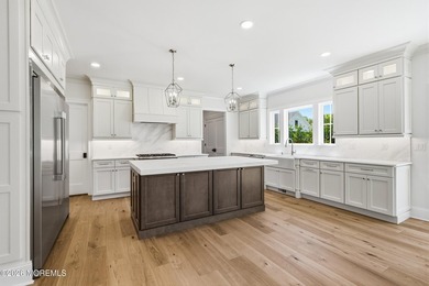 Experience exceptional luxury in this custom-built luxury - photo 6
