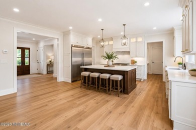 Experience exceptional luxury in this custom-built luxury - photo 7