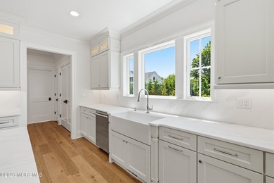 Experience exceptional luxury in this custom-built luxury - photo 9